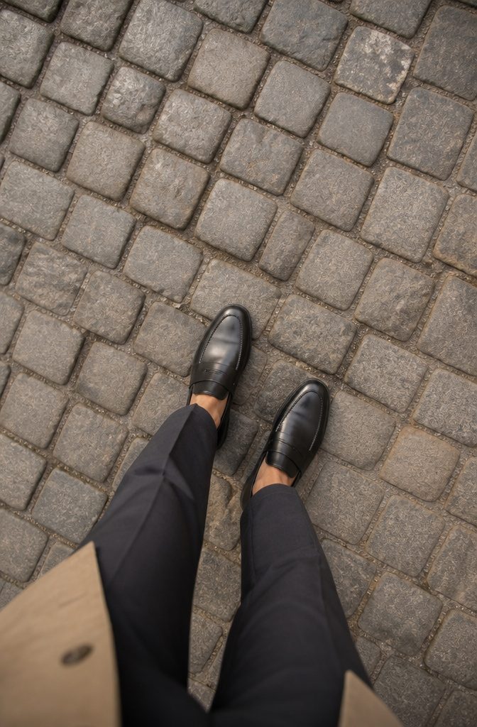 Smart Casual Dress Code: 9 Pieces That Work Every Time 8 A pair of sleek loafers displayed on a flat surface.